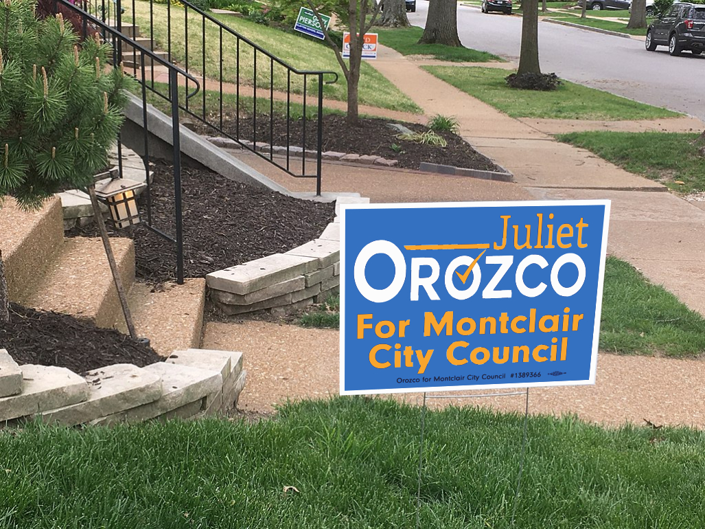 Juliet Orozco for City Council yard sign on grassy front yard